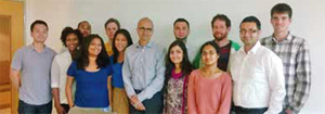 Riddhi Mehta MS'13 (third from left in blue top), pictured with Microsoft CEO Satya Nadella (center)