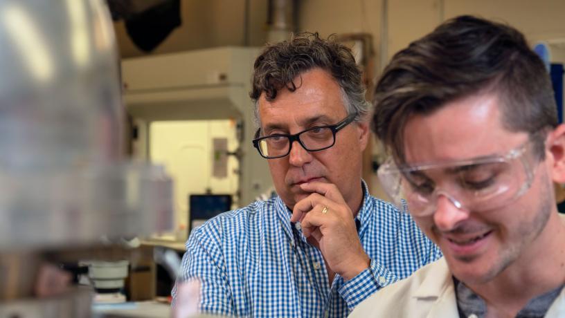 Prof. Alan West with a student at the Columbia Electrochemical Energy Center.