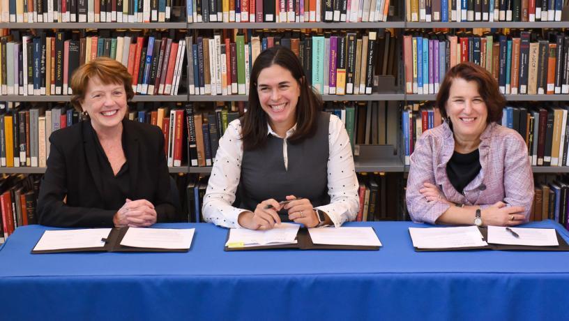 Dean Mary C. Boyce, Barnard President Sian Leah Beilock, and Barnard Provost Linda Bell formalizing the partnership.