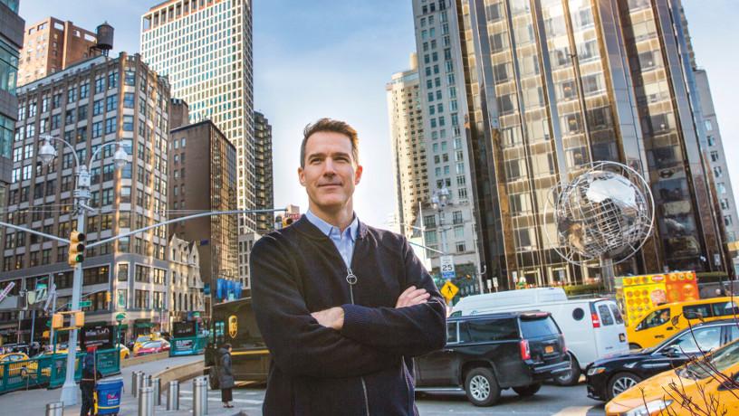 Prof. Andrew Smyth at Columbus Circle with traffic in the background.