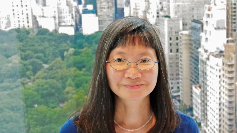 Portrait of Elizabeth Tom with Central Park in the background.