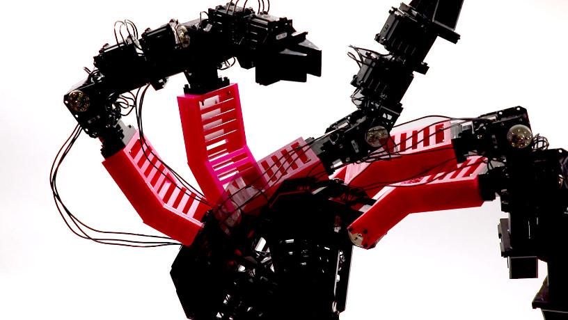 Image of the robotic arm in multiple poses while collecting data through random motion.