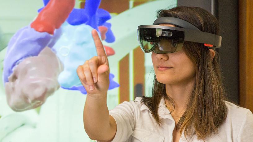 Medical student in Steve Feiner's lab wearing an AR device for computer-aided surgery.