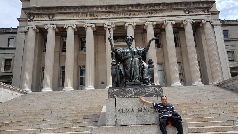 Aminuddin Ab Ghani on the Low Library steps by the Alma Mater sculpture.