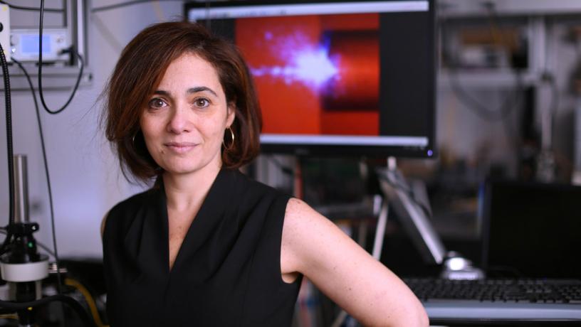 Portrait of Prof. Michal Lipson in her lab.