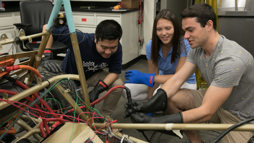 Three ’20SEAS students working on the EV chassis in the Columbia’s Motor Drives and Power Electronics Lab.