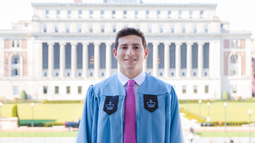 Portrait of Izzet Kebudi with the Butler library in the background.