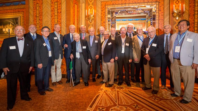 Members of the Golden Lions posing for a group picture in the Russian Tea Room.